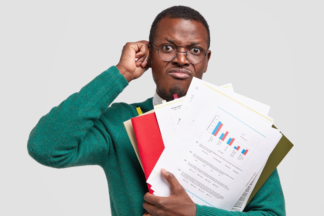 man holding accounting papers 